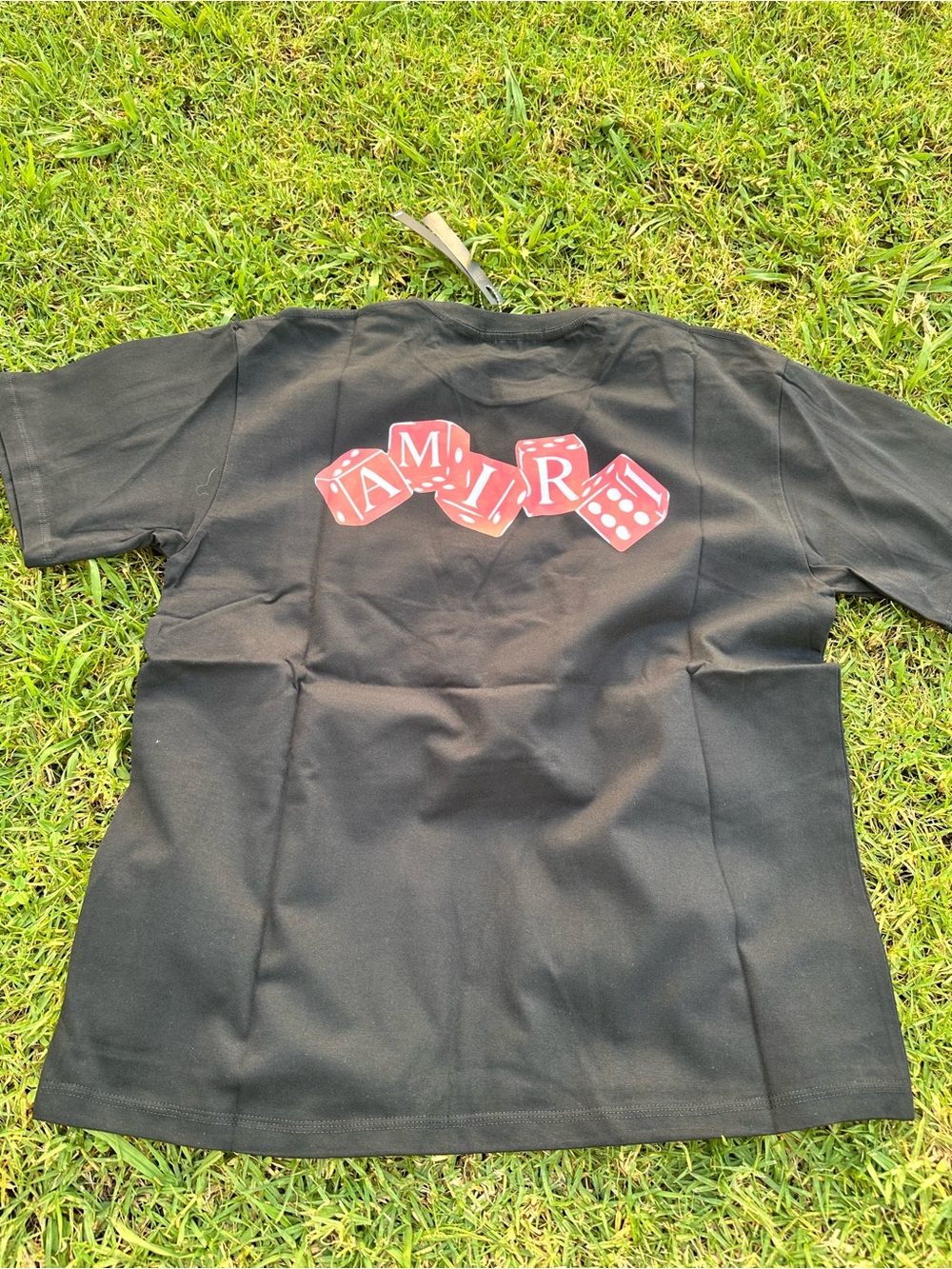 Amiri dice tee